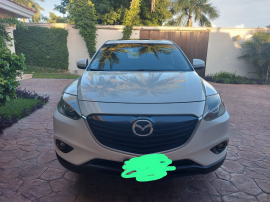 Mazda CX-9 Mod 2015, piel, quemacoco, 1 solo dueño, 81,000 km. Color blanca, factura local. Inf. 9991-22-21-70 y 9997-38- 86-22  ID:3081128